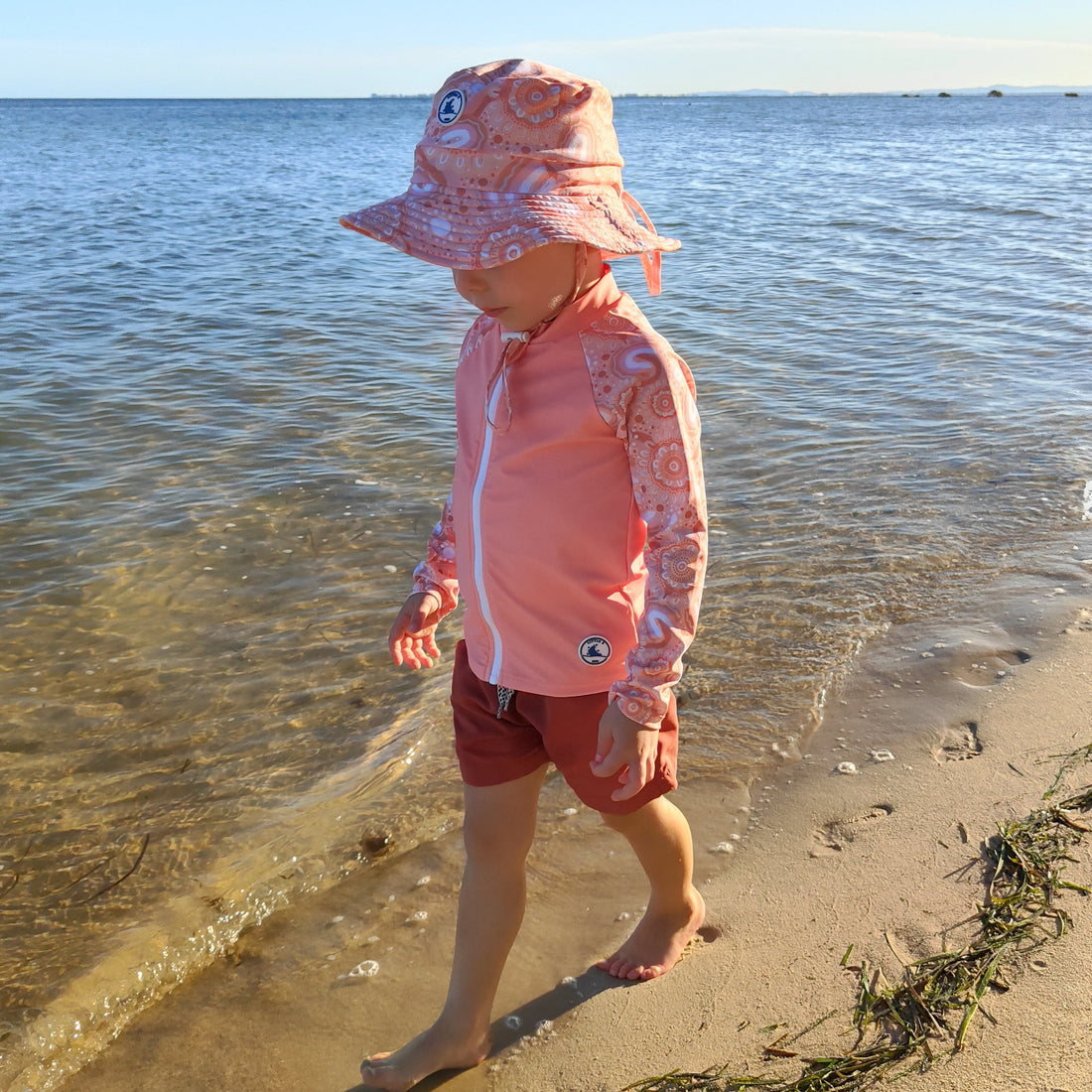 Reversible Swim Hat - Community Connected to Land Size 6-24M